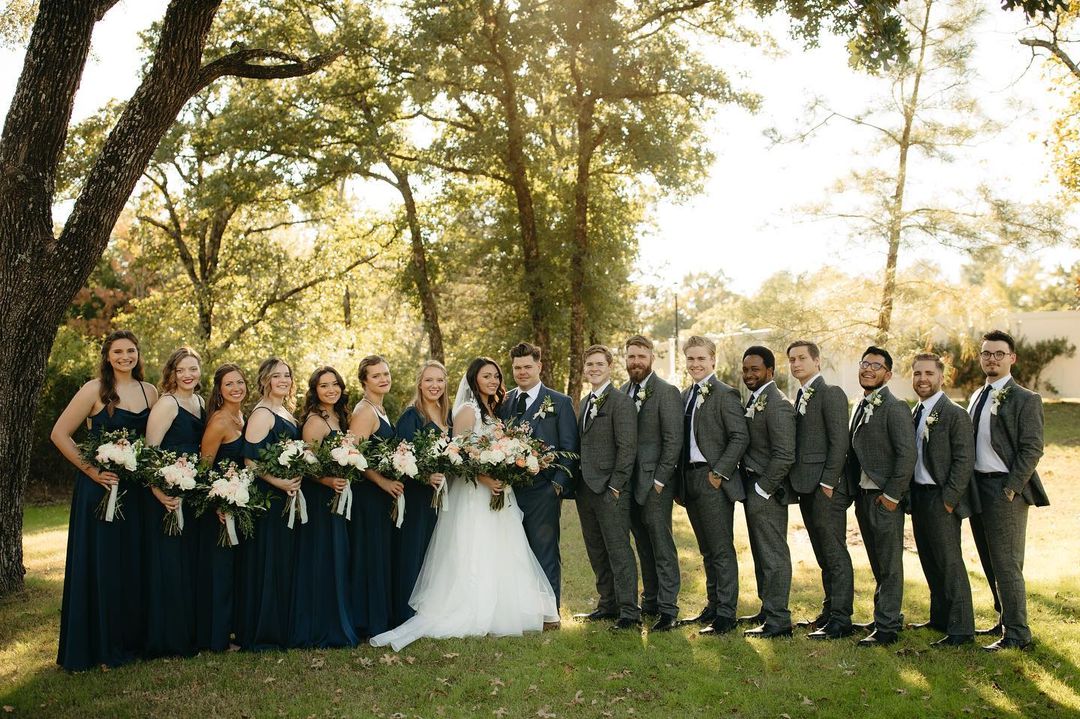 A group of people standing next to each other
