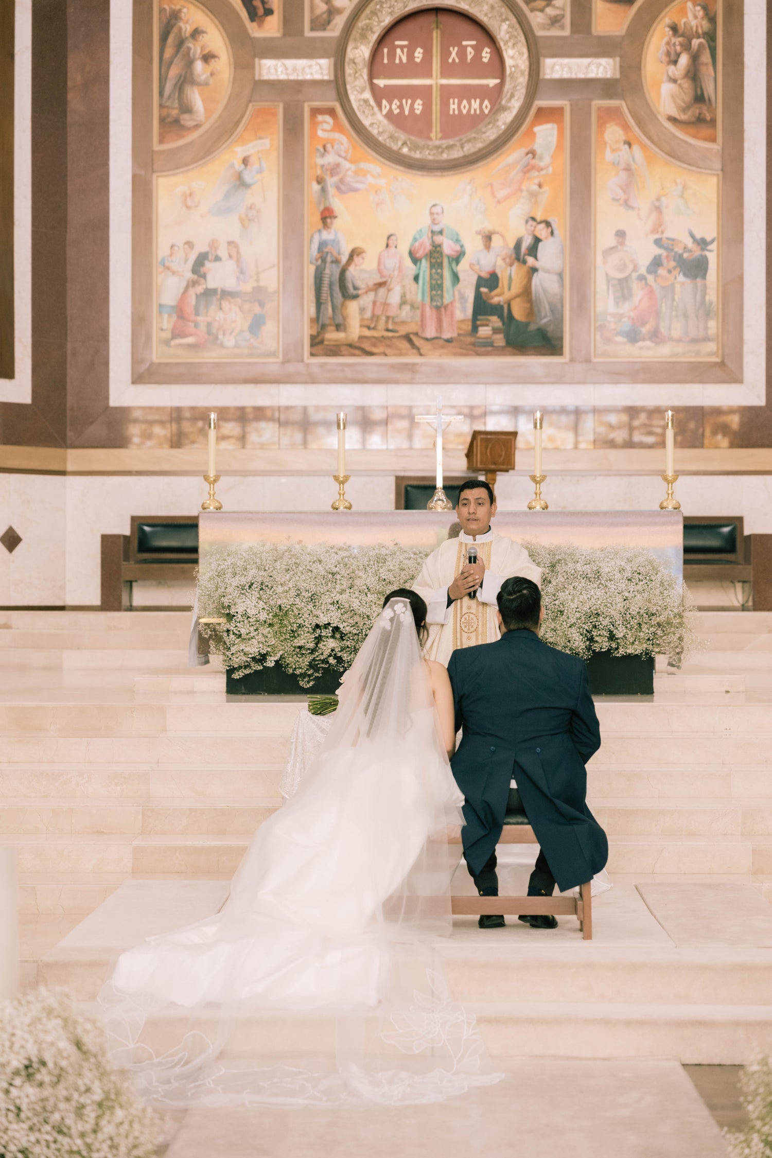 couple in church wearing weeding dress