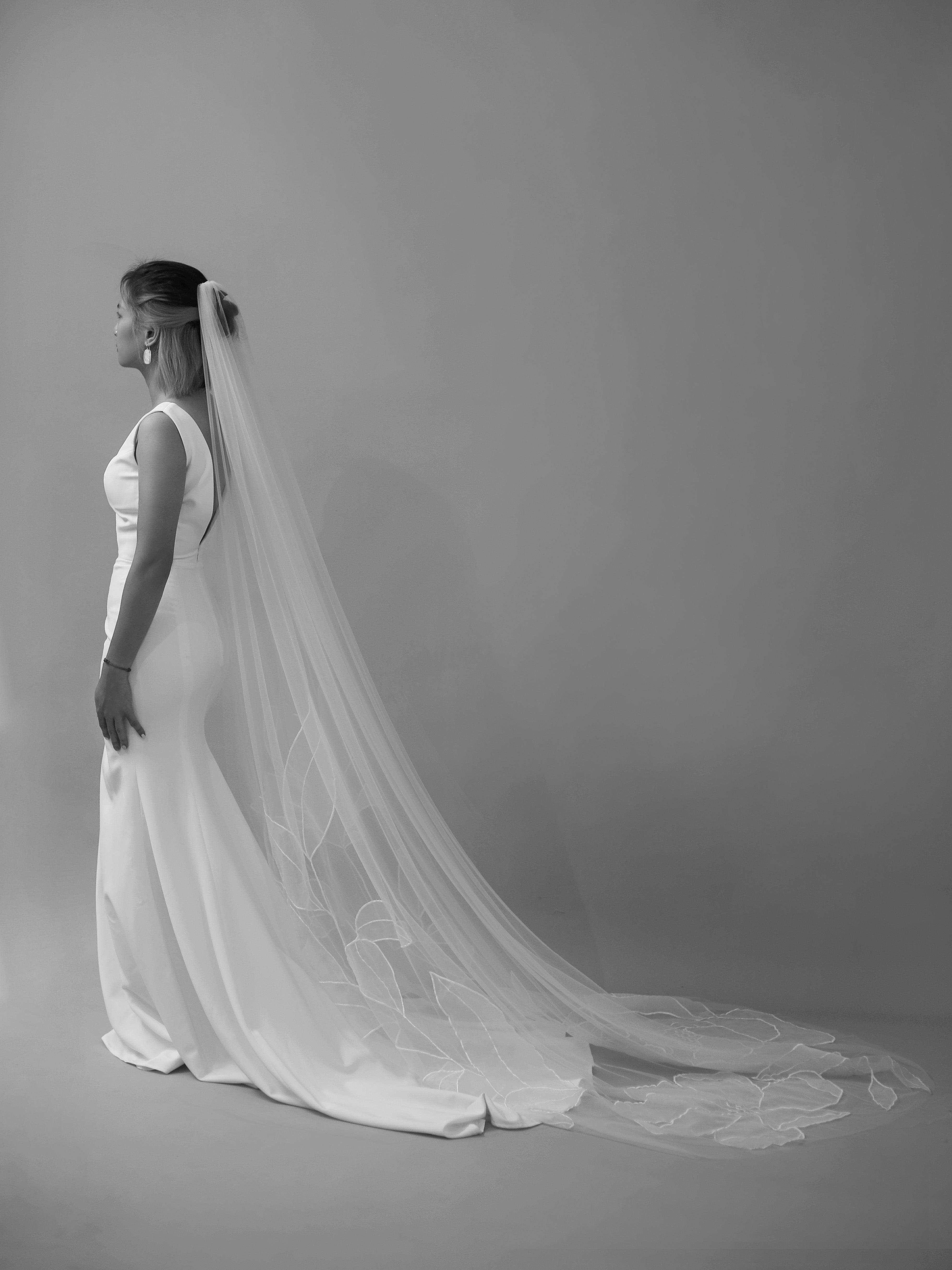 Side profile of bride with Kaitie cathedral embroidery floral veil