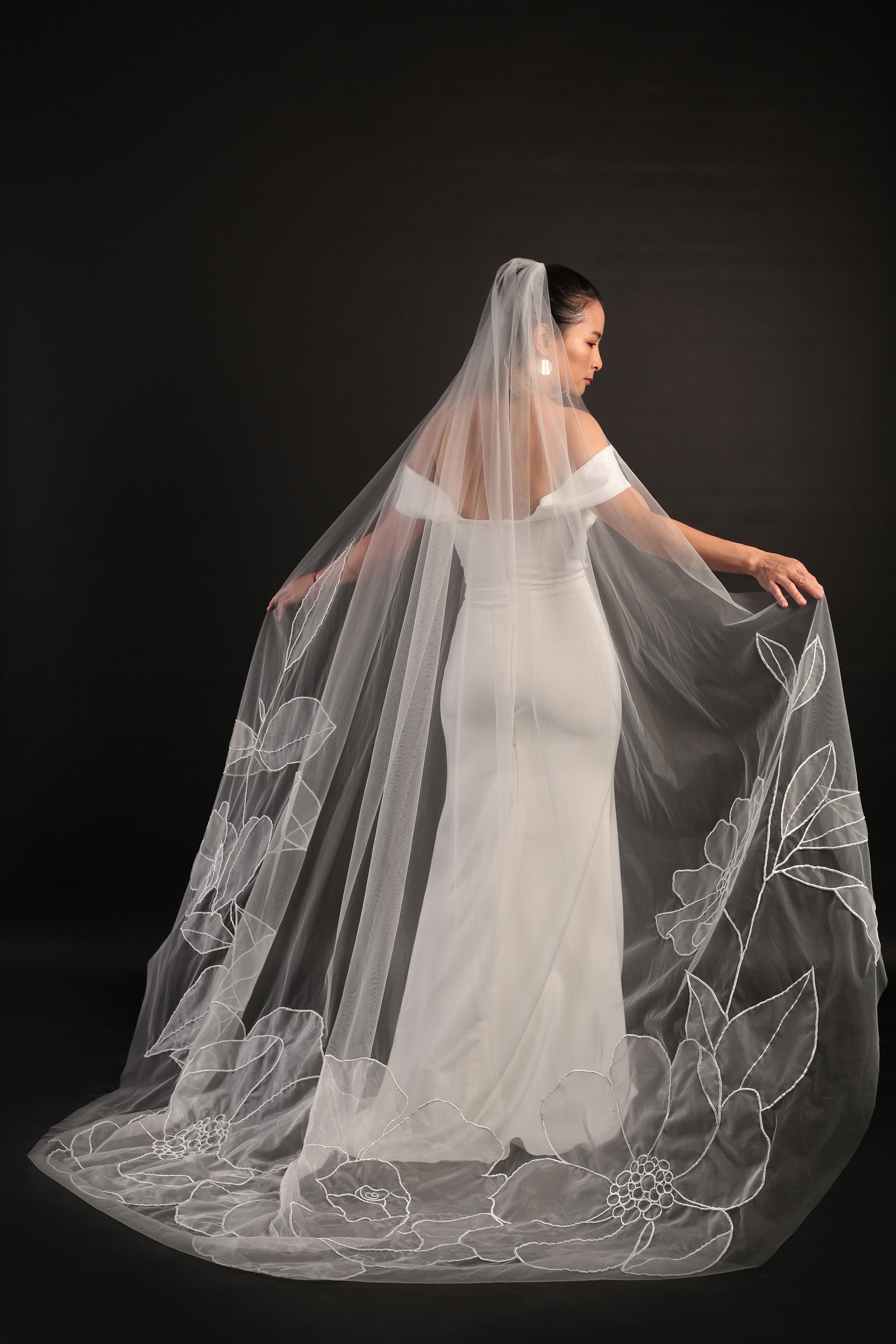 Lilly organza floral veil design from right side behind