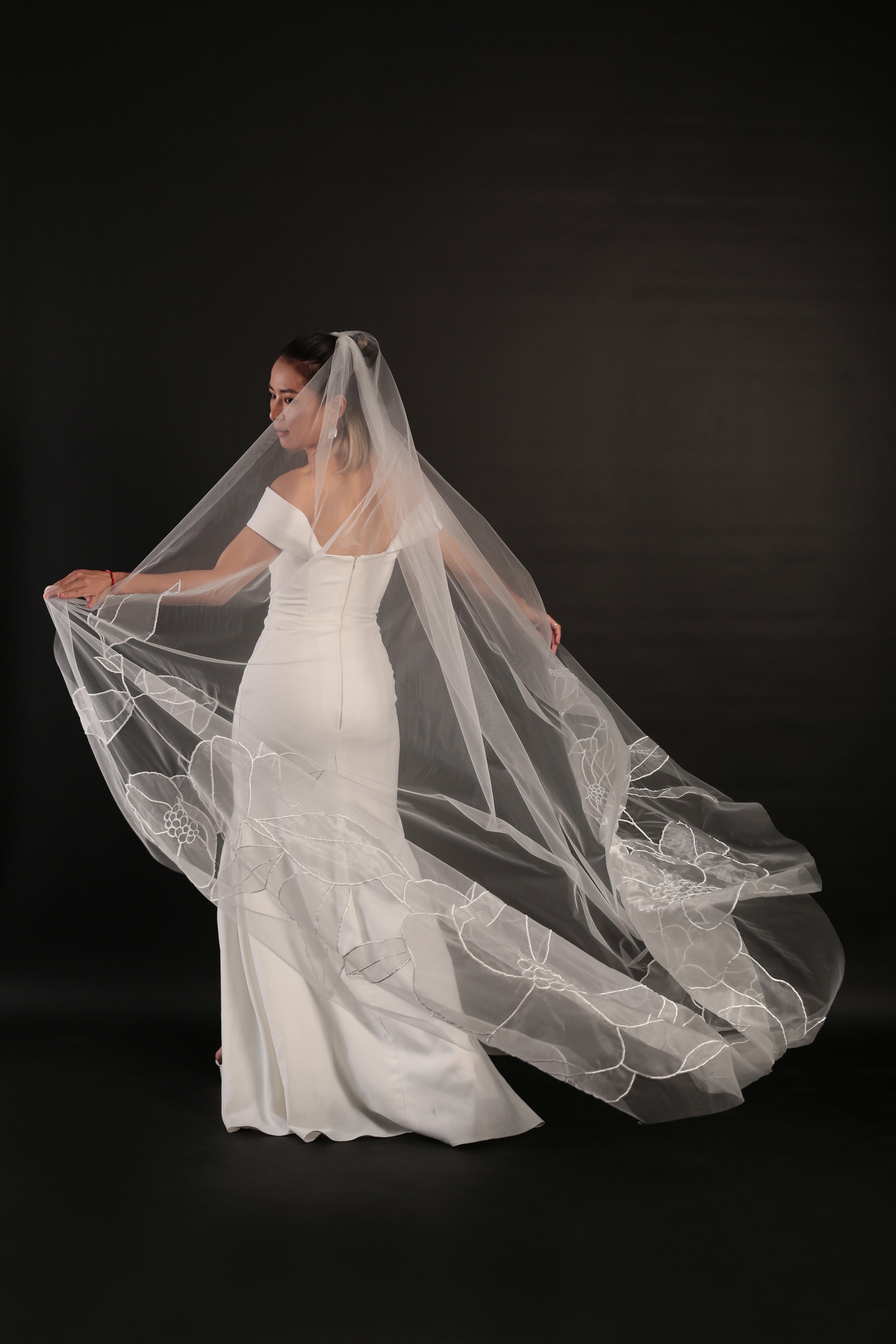 Lilly organza floral veil design from styled left side behind