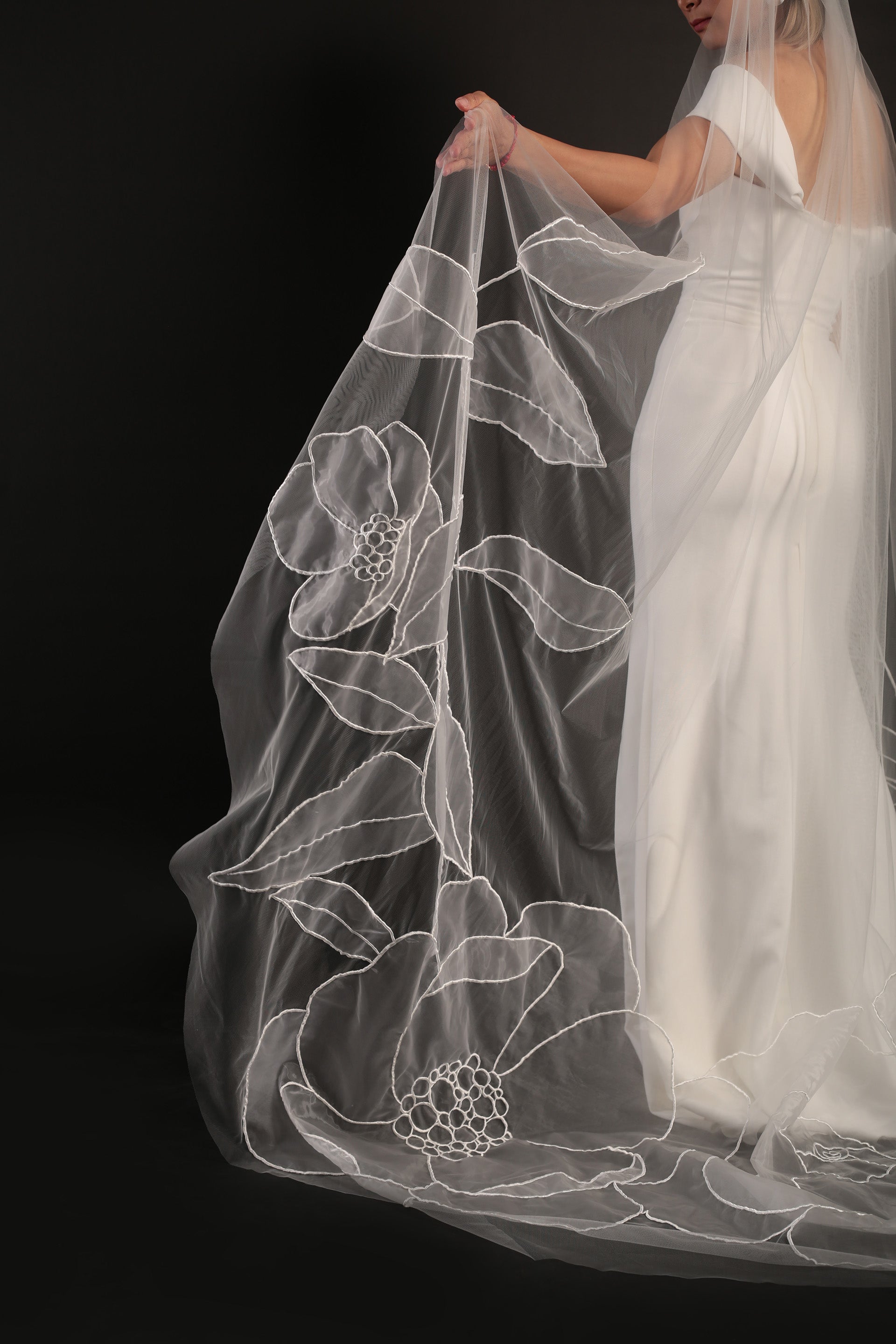 Detailed view of organza floral accents on Lilly bridal veil