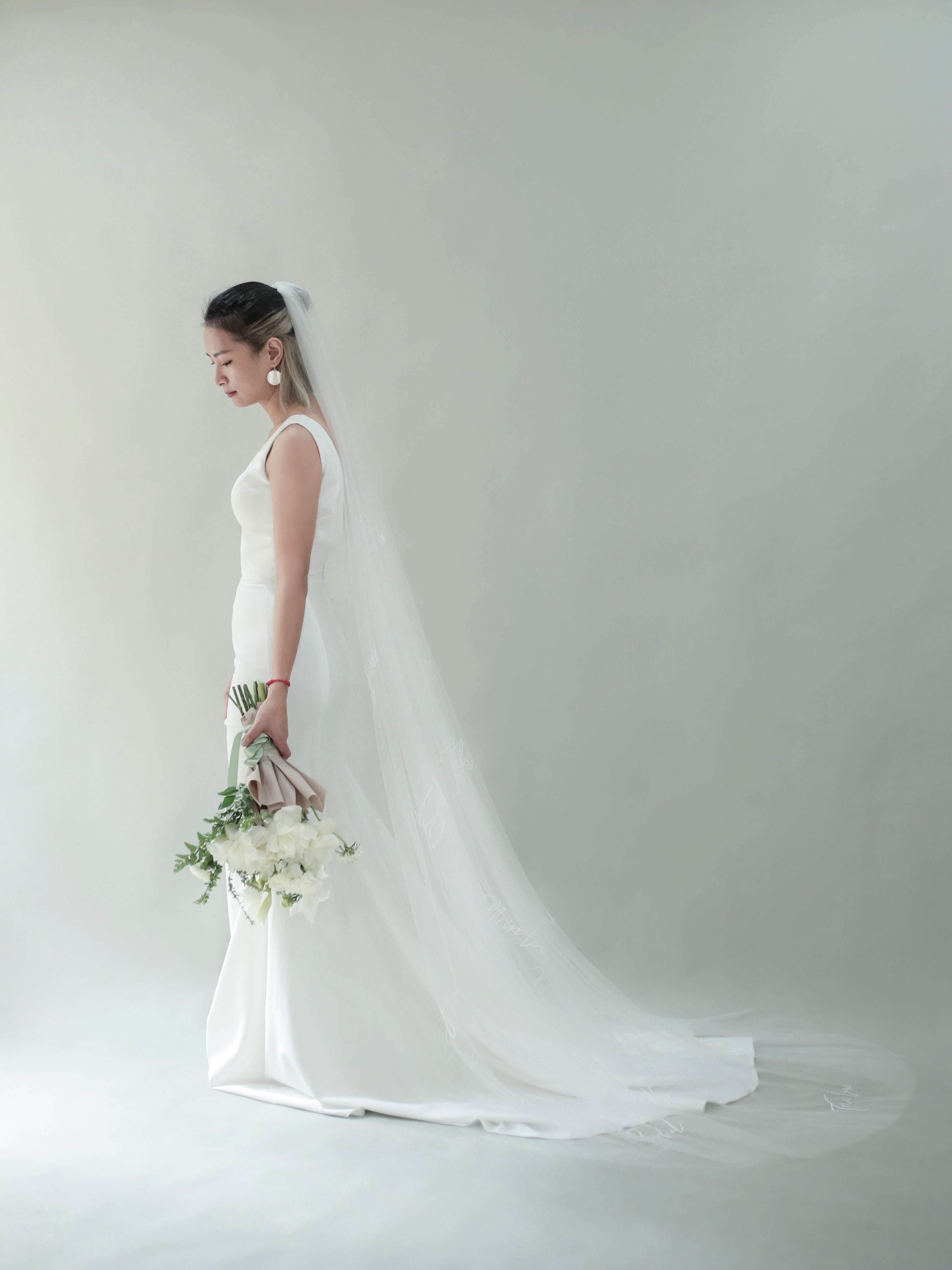 left side view of lady wearing ARIS | Embroidered veil
