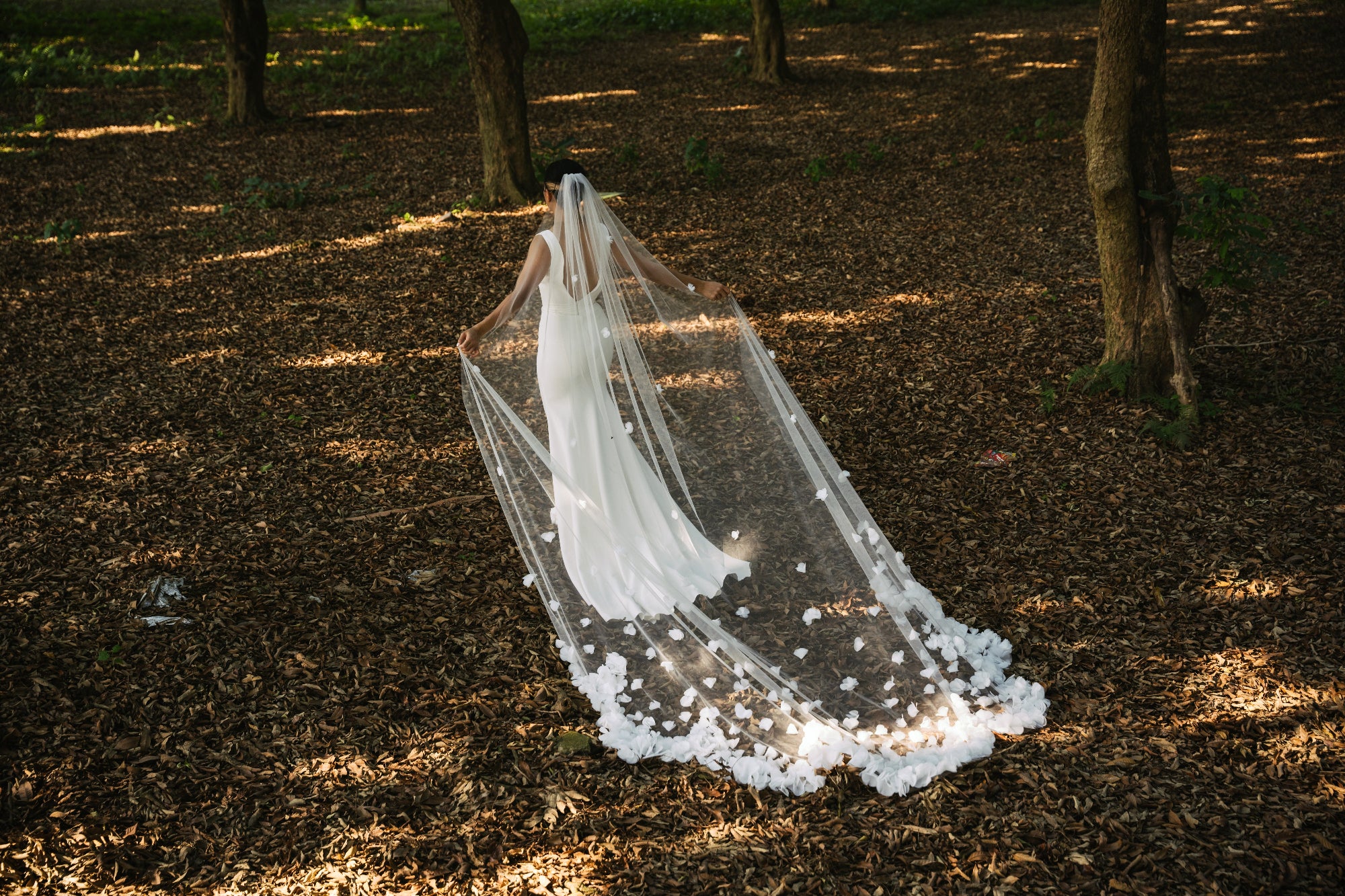 Bella 3D floral wedding veil, ivory tulle, clump of flower petals design, cascading to a scallop-shaped train