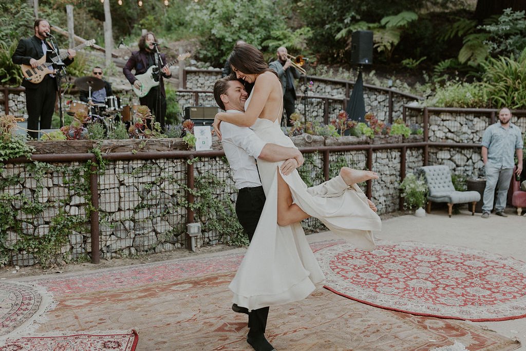 A botanical garden rustic warm and intimate wedding featuring a band