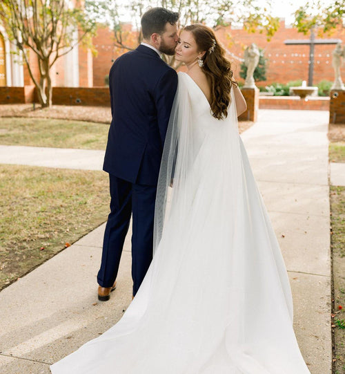 Bride Madeline Ringwald floral cape Kaitie veil