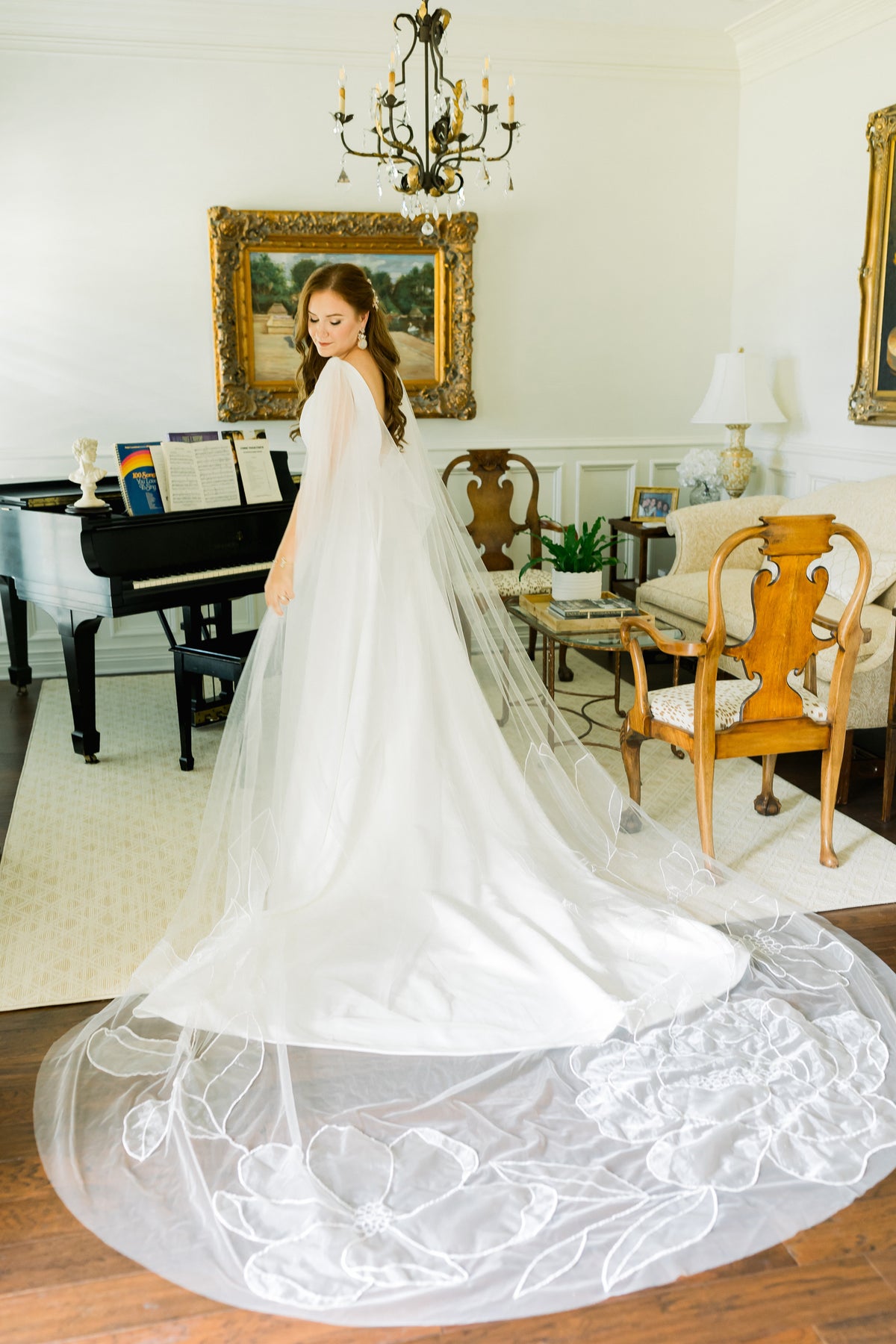 Bride Madeline Ringwald floral cape Kaitie veil