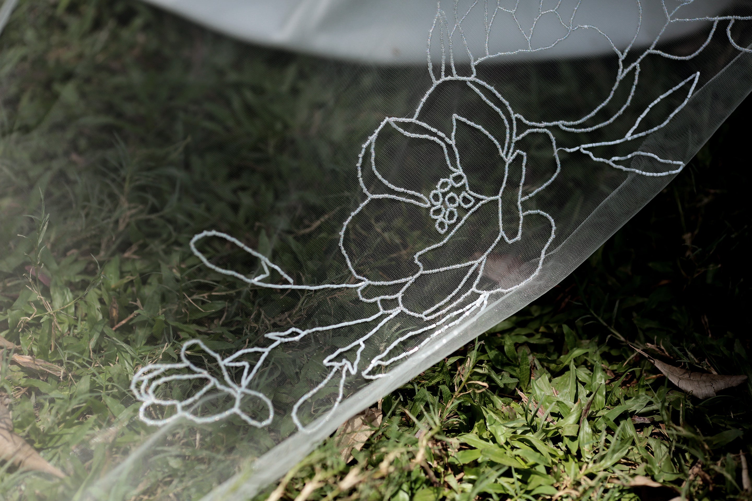 A beautiful beaded floral wedding veil from the Cassandra collection.

