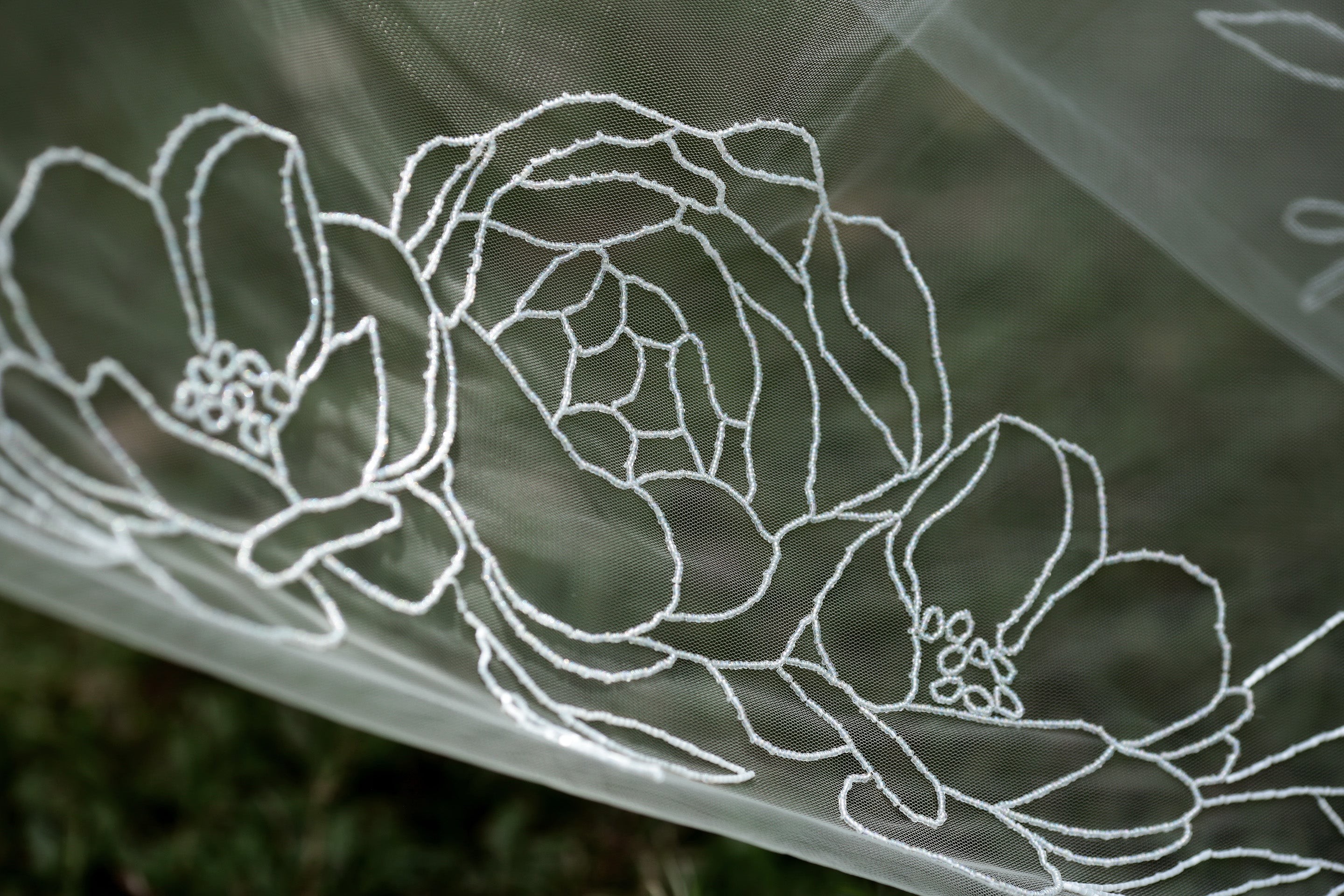 Sparkling intricate beaded roses and peonies veil, cathedral length
