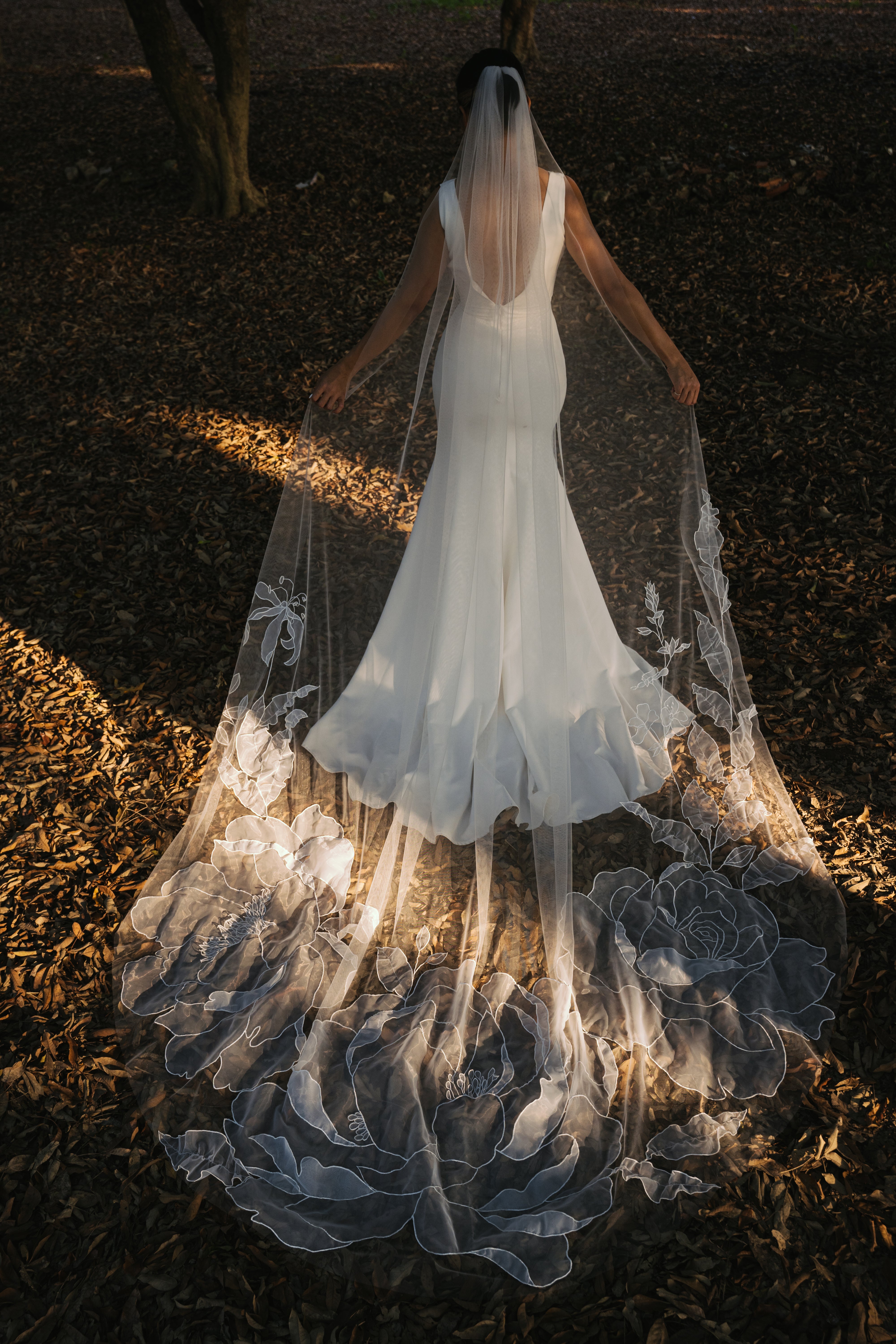 cathedral length wedding veil with 3D gloriosa flowers and embroidered peonies, handcrafted for depth and dimension, tulle and organza fabric

