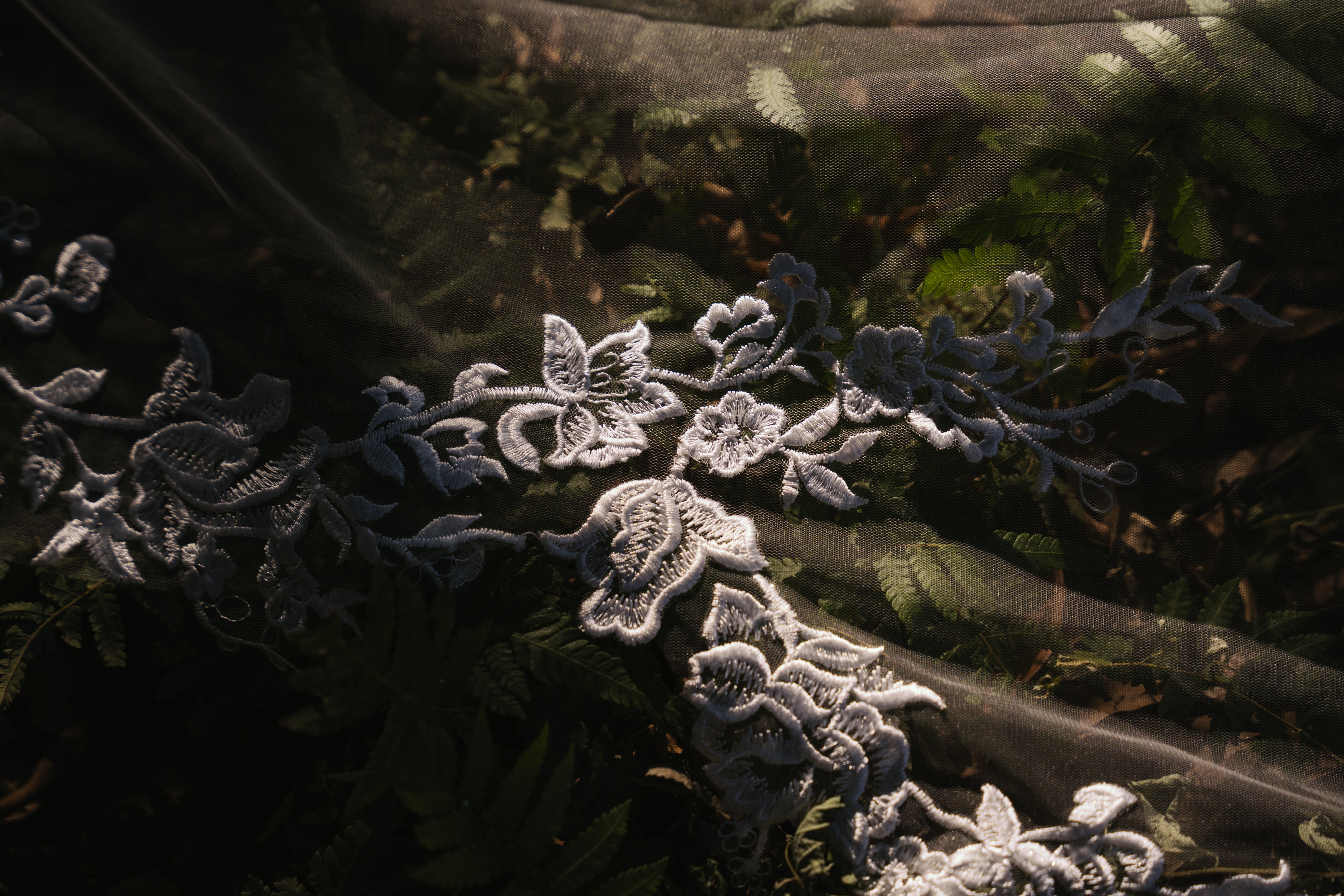 The "ELA" veil, showcasing the detailed lace along the train.

