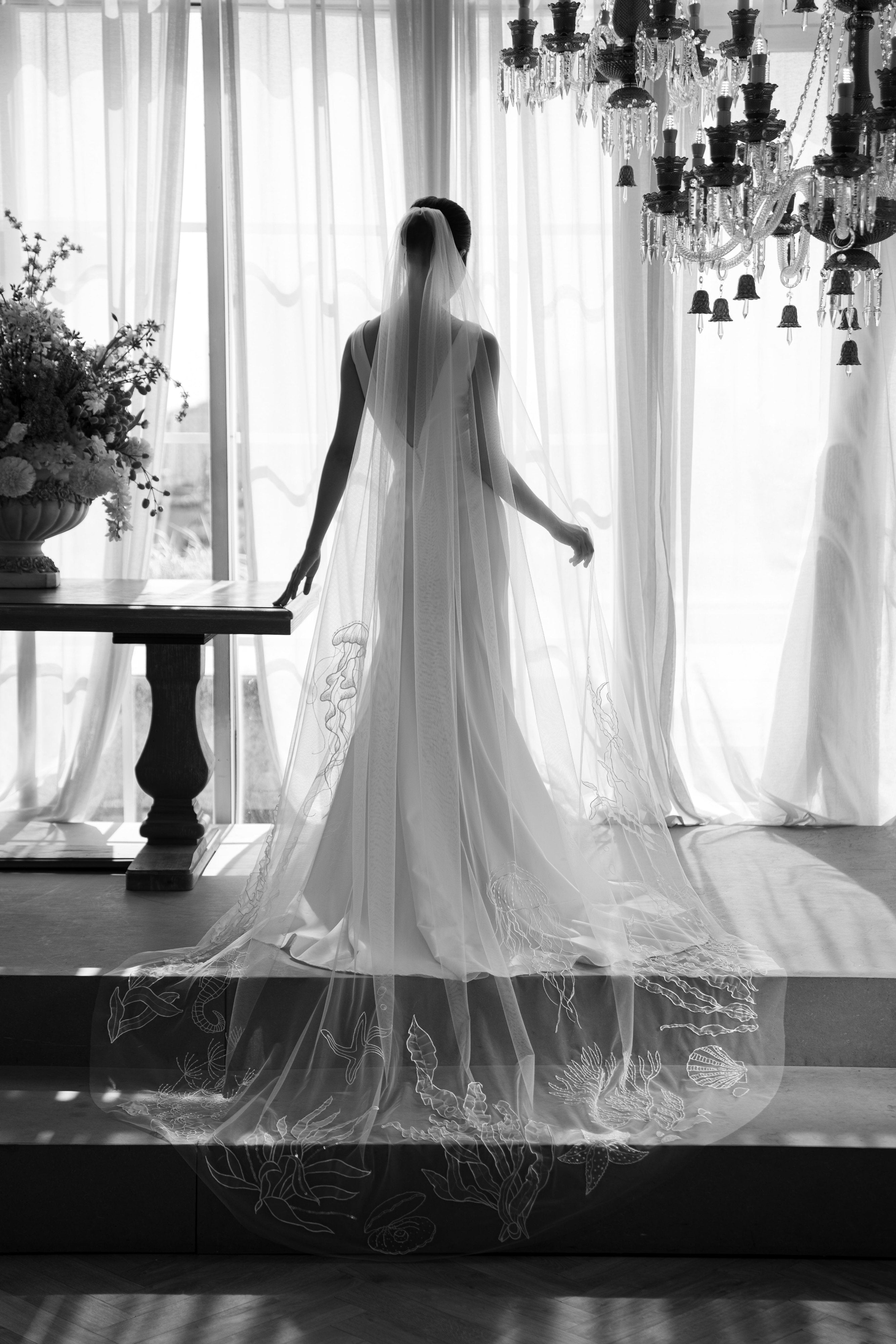behind shot of a bride wearing OCEAN Veil | 3D embroidered wedding veil