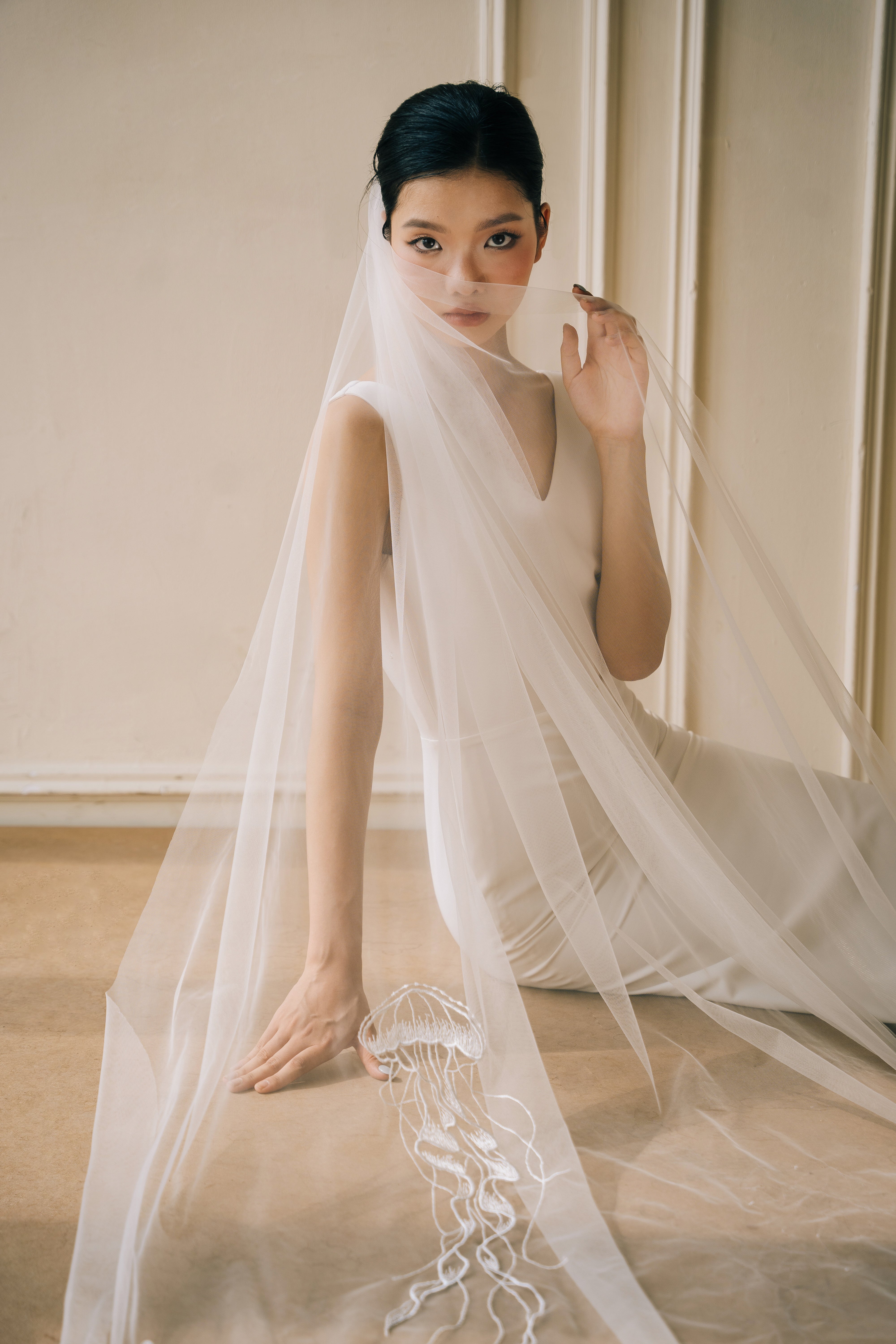 close up shot of bride wearing OCEAN Veil | 3D embroidered wedding veil