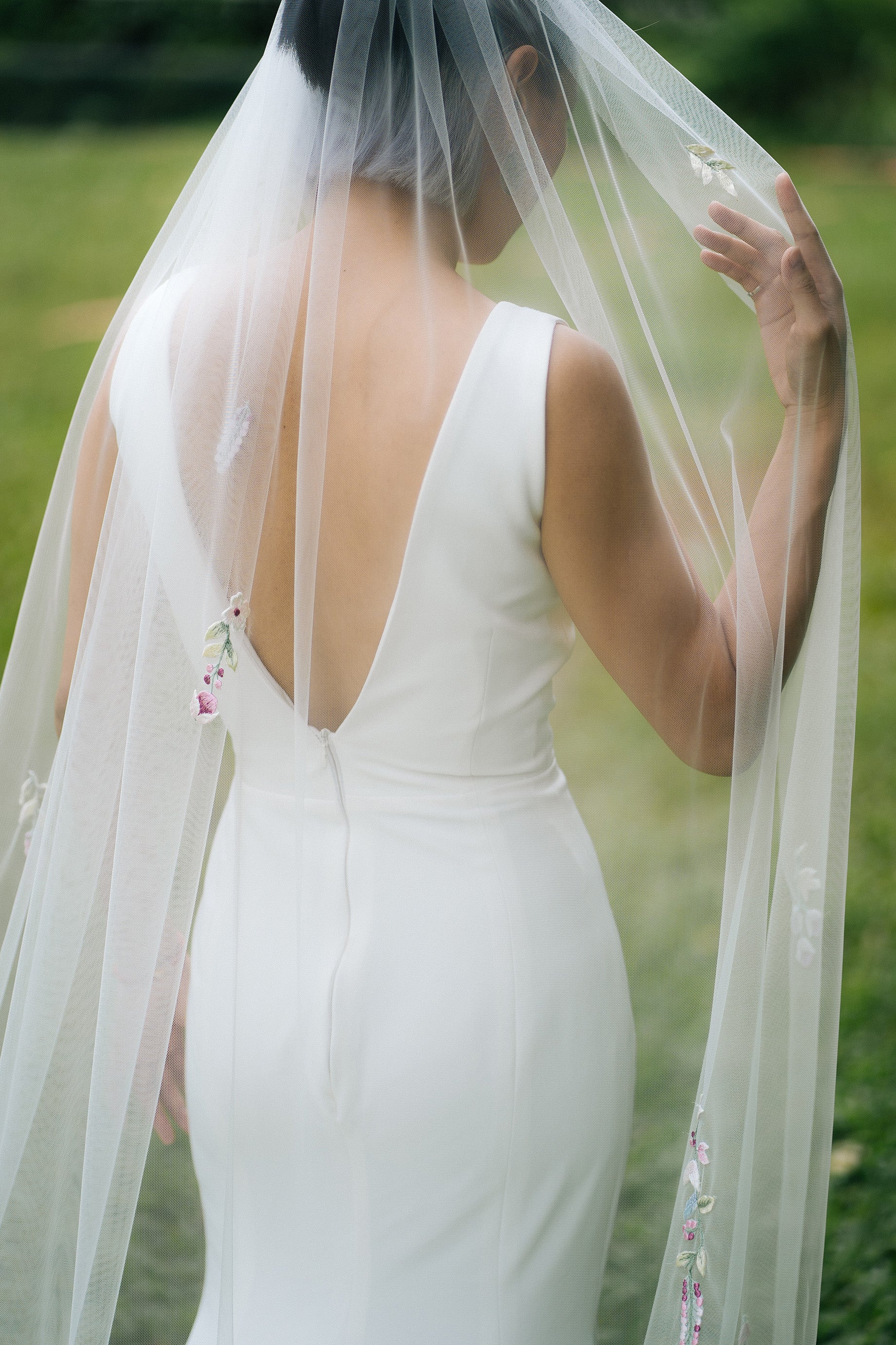 a bride wearing MARINA | Colorful embroidery wedding veil 