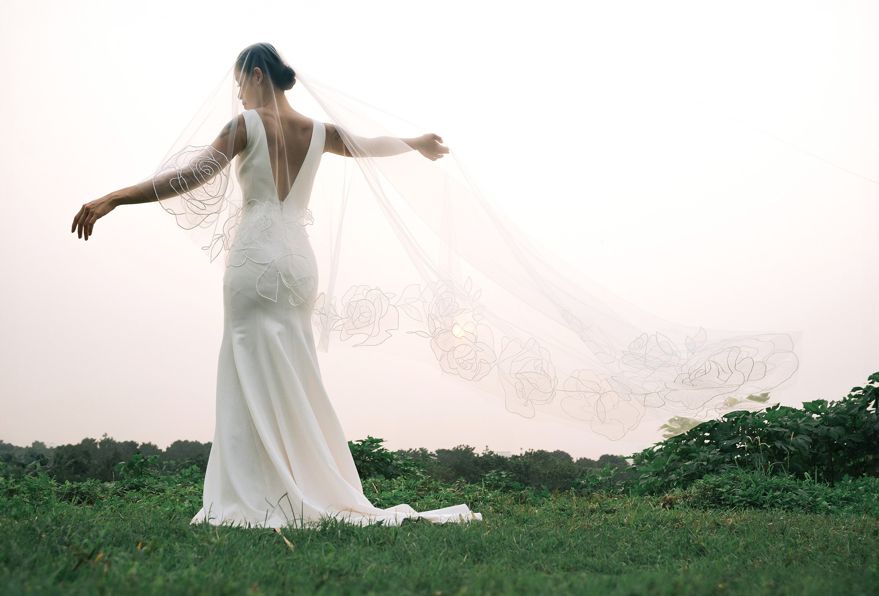 a shot from behind of CHARLOTTE | Cathedral organza wedding veil