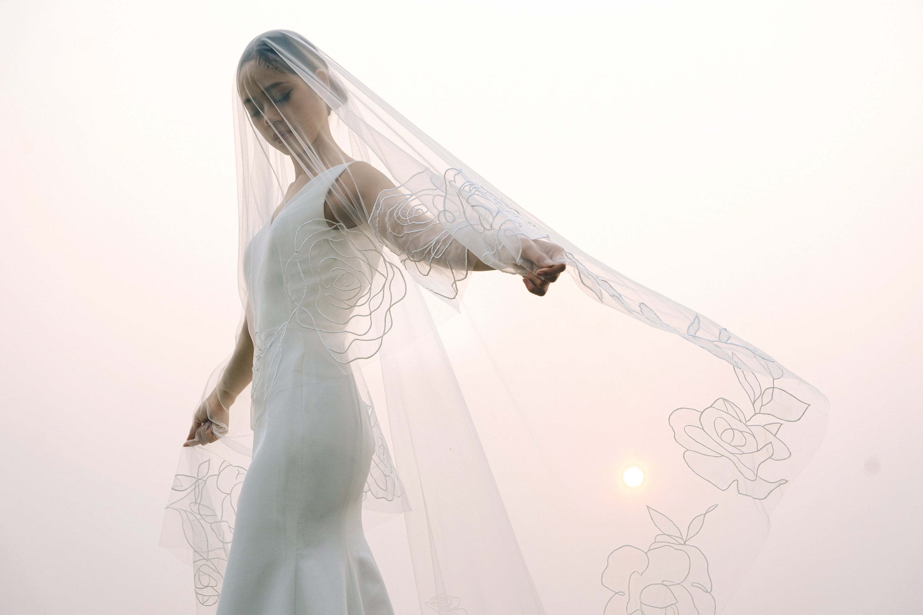 cinematic shot of a bride wearing CHARLOTTE | Cathedral organza wedding veil