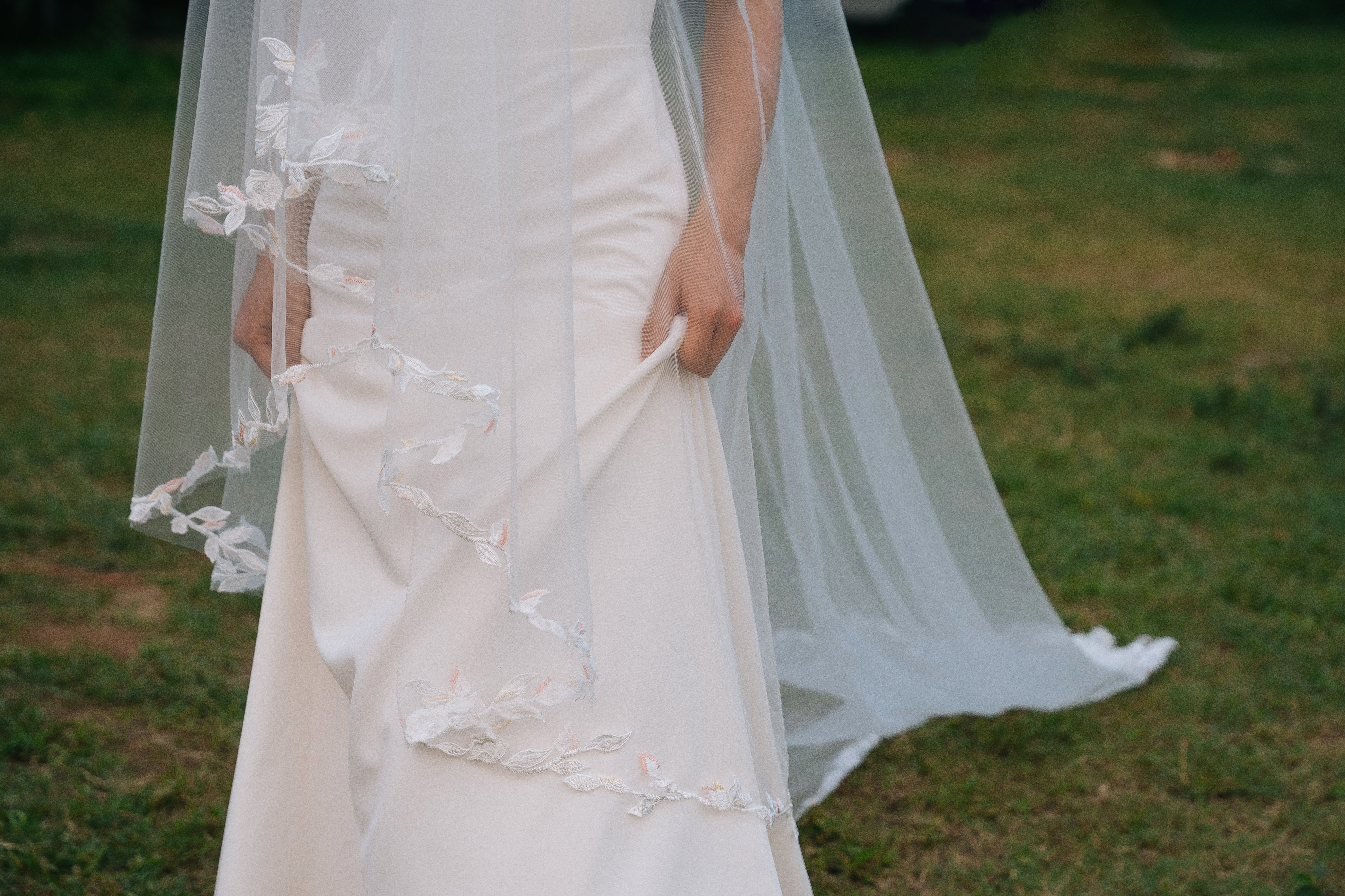 close up front side of BRITTNIE Cathedral Floral Lace Veil with Blusher
