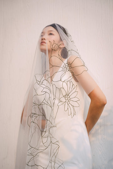Bride wearing a floral veil