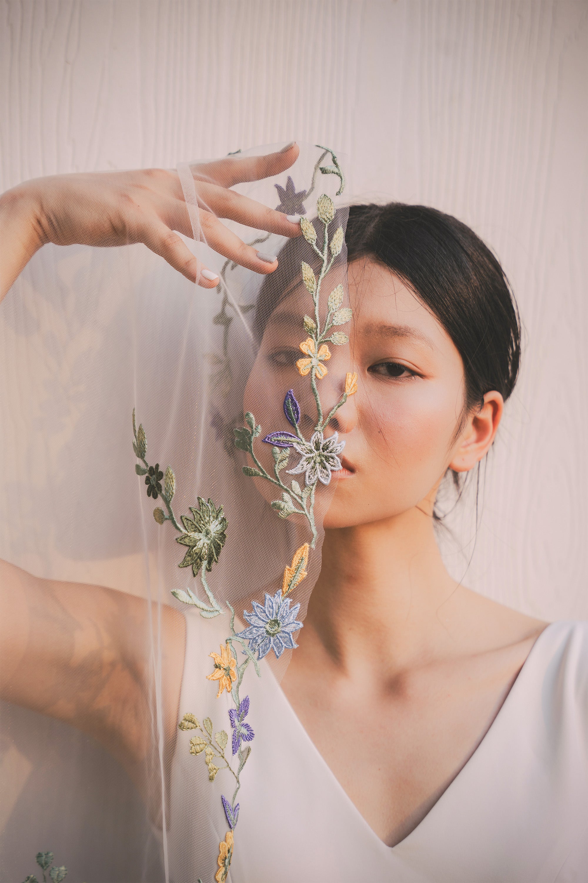 front view closeup shot of PAOLA | Colorful floral lace wedding veil