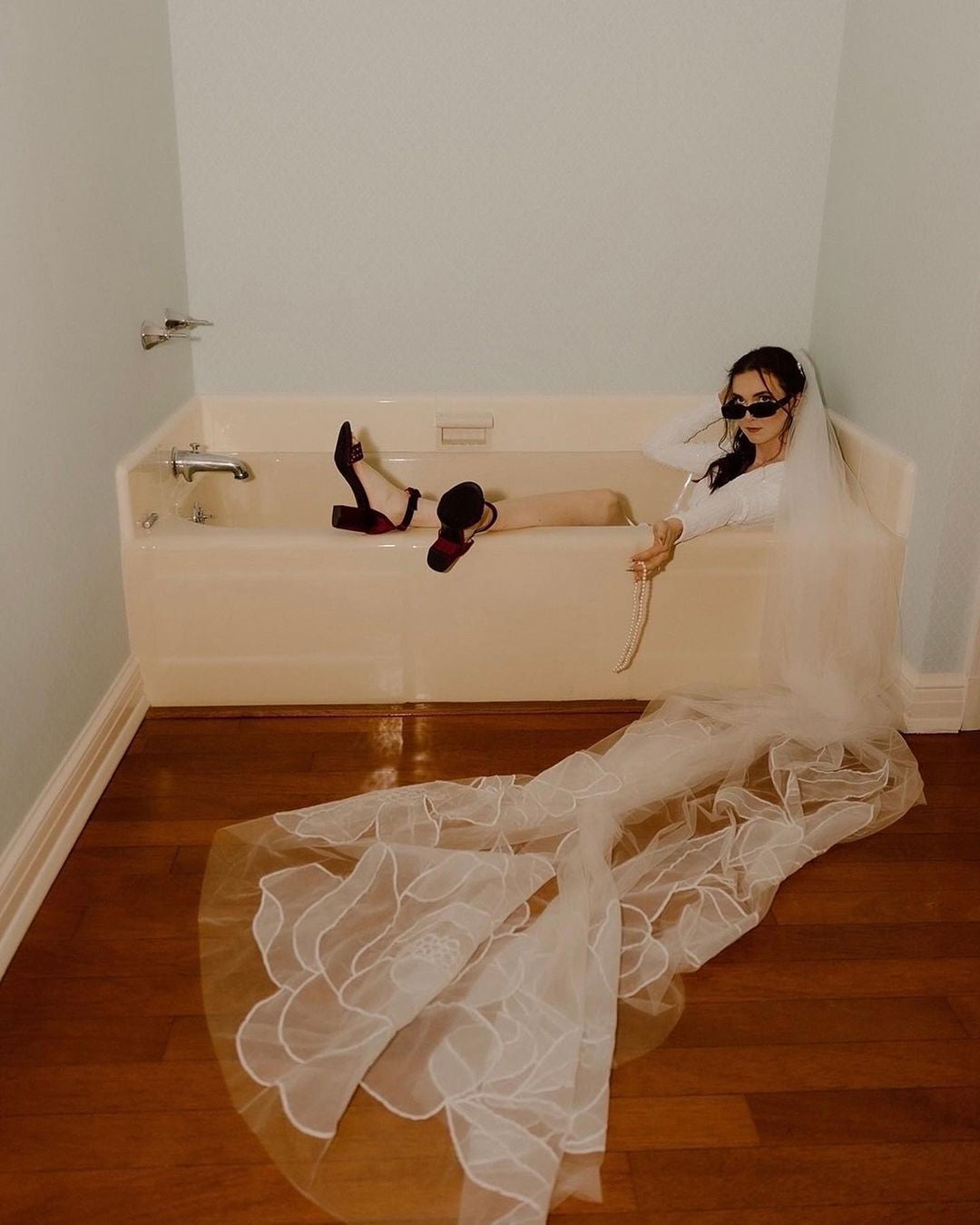 style picture of bride wearing KAITIE | Cathedral embroidery floral veil
