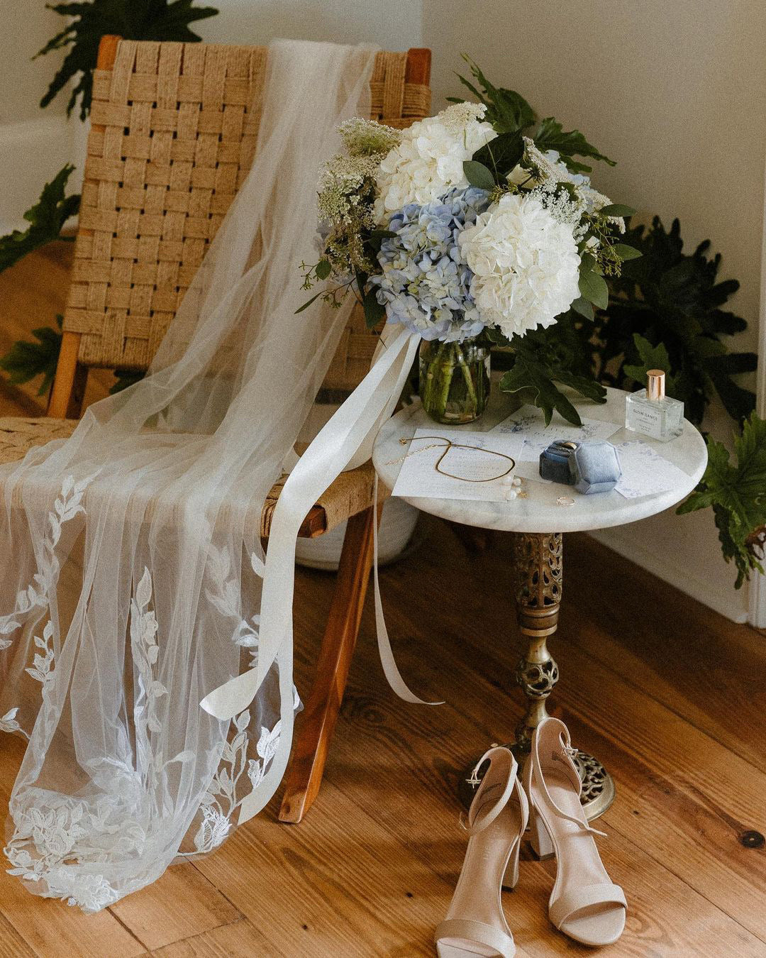 Linda chapel floral lace veil displayed flat