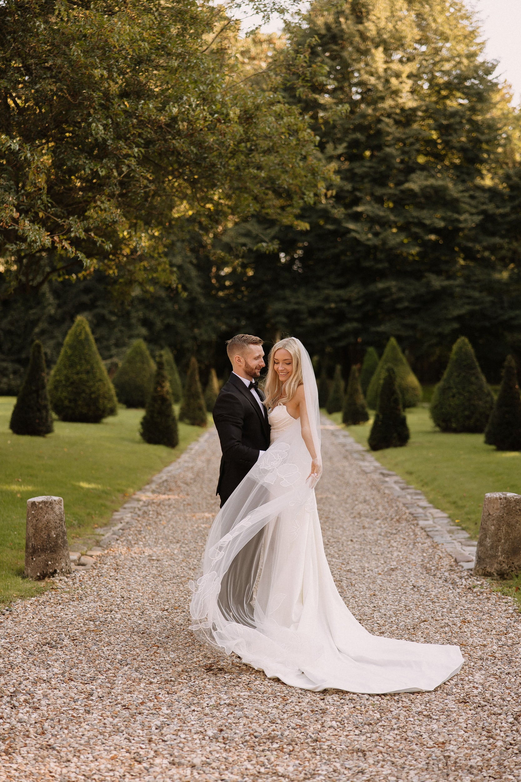 romantic picture bride wearing Rosie chapel organza floral veil