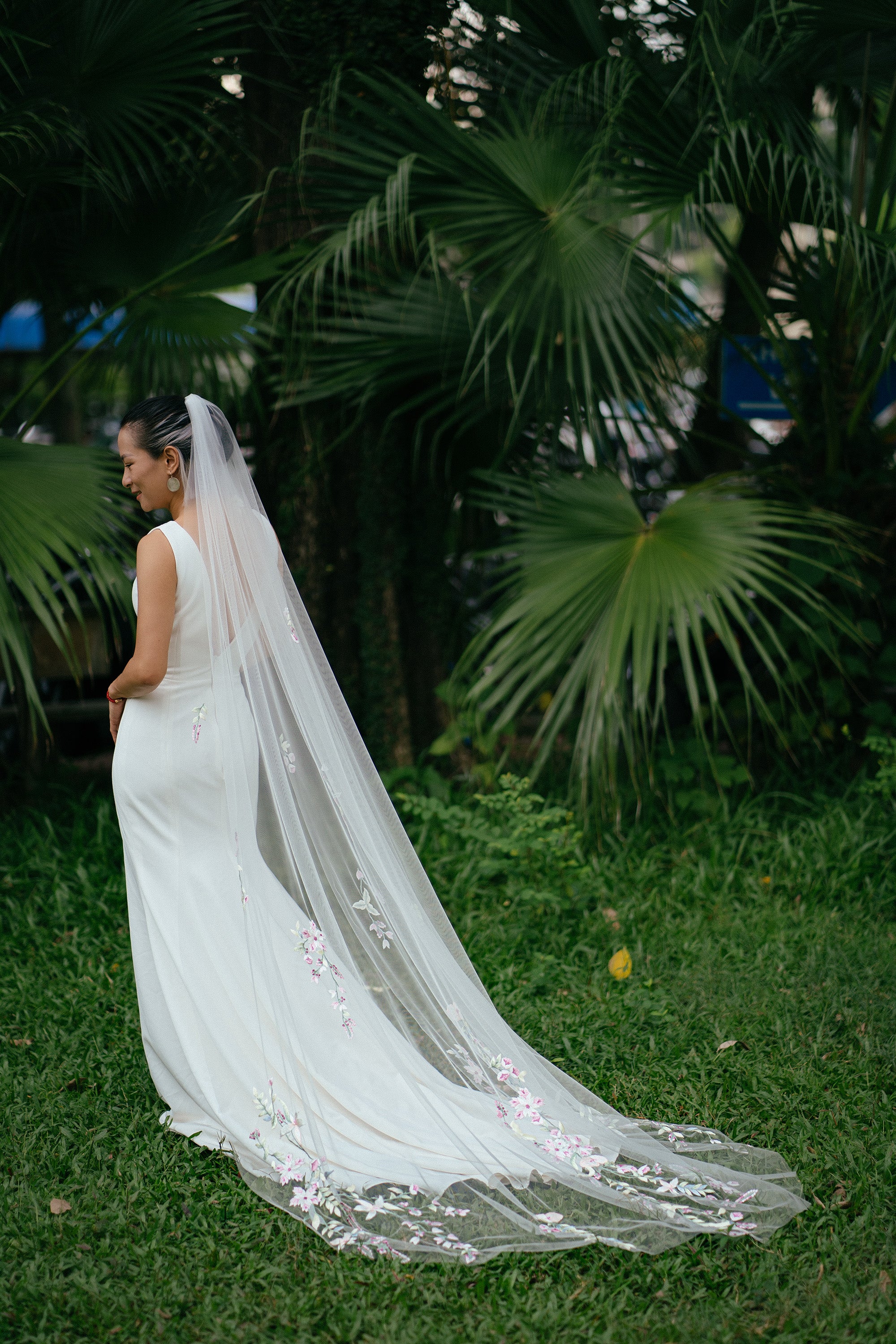 A romantic, feminine pink flower embroidery lace wedding veil, suitable for botanical, bohemian, garden, natural wedding theme
