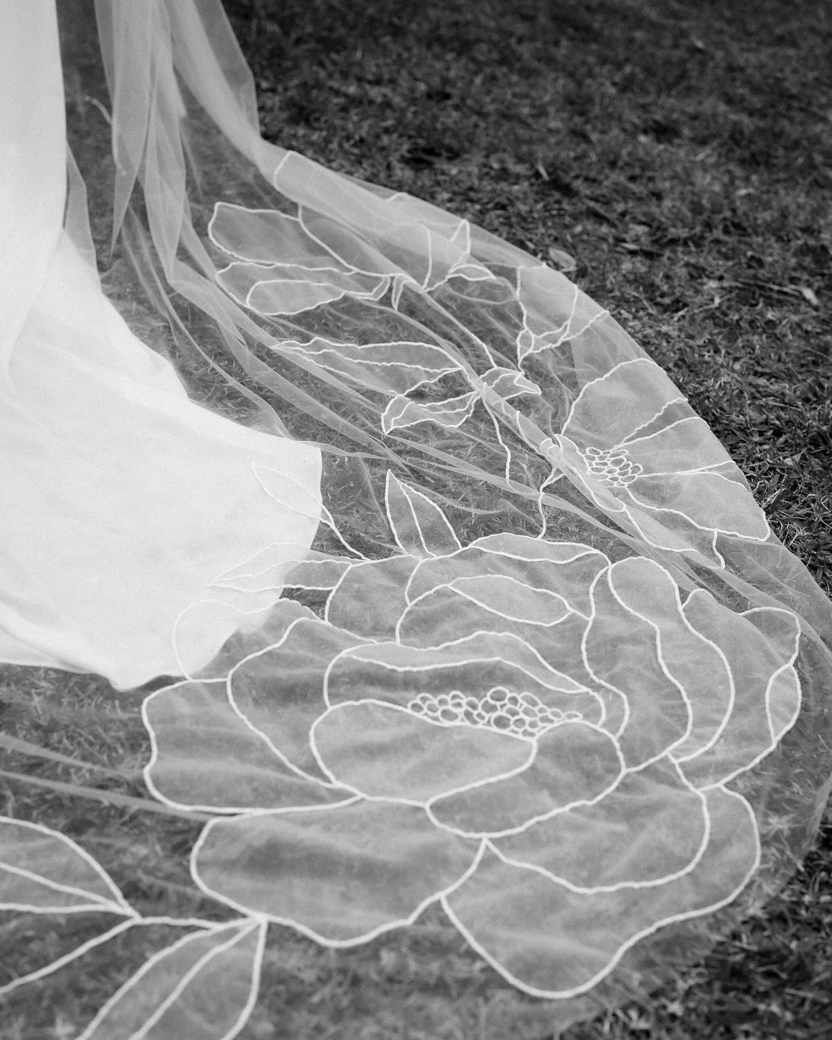 A wedding dress with a flower on it