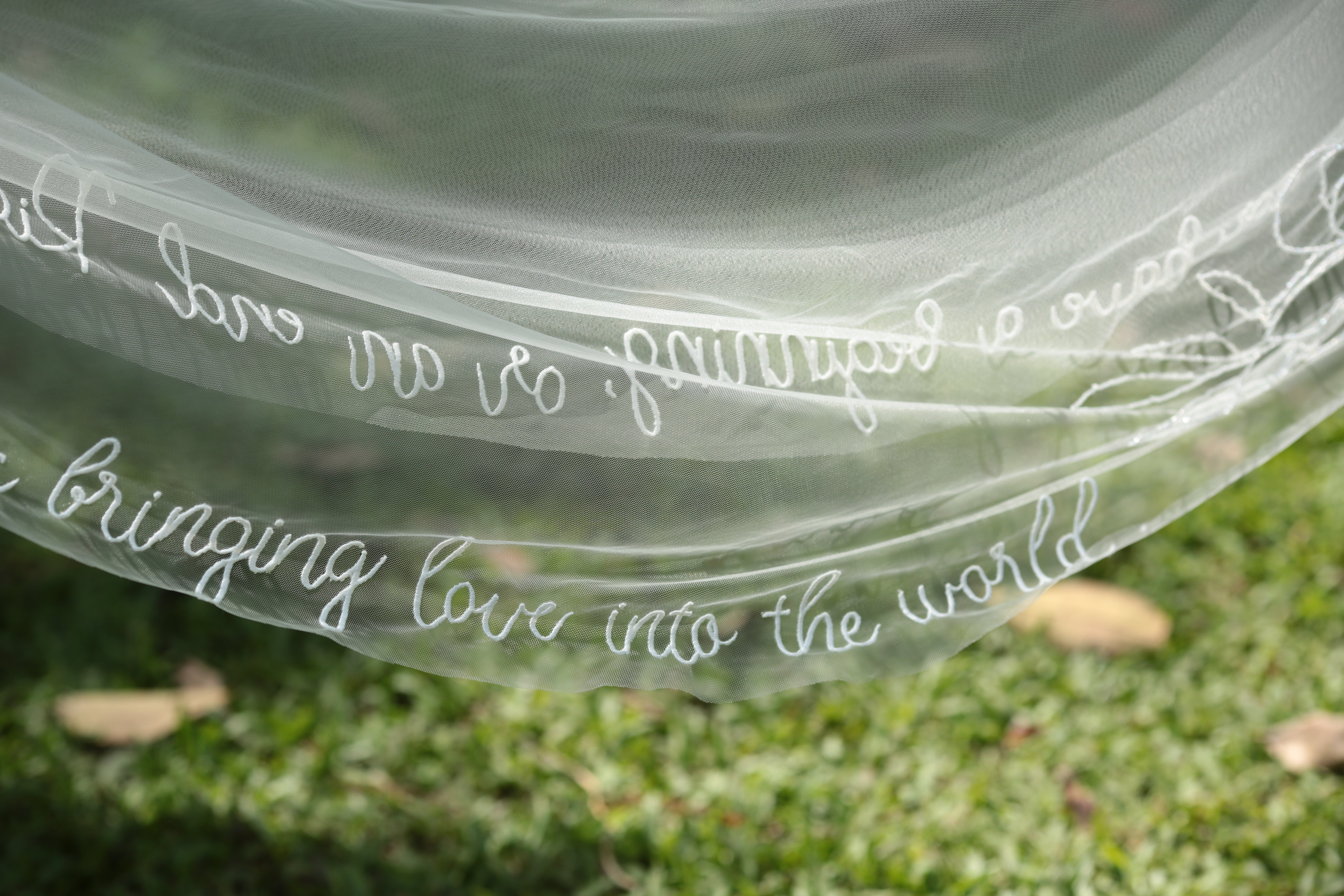 beaded floral veil with love quotes
