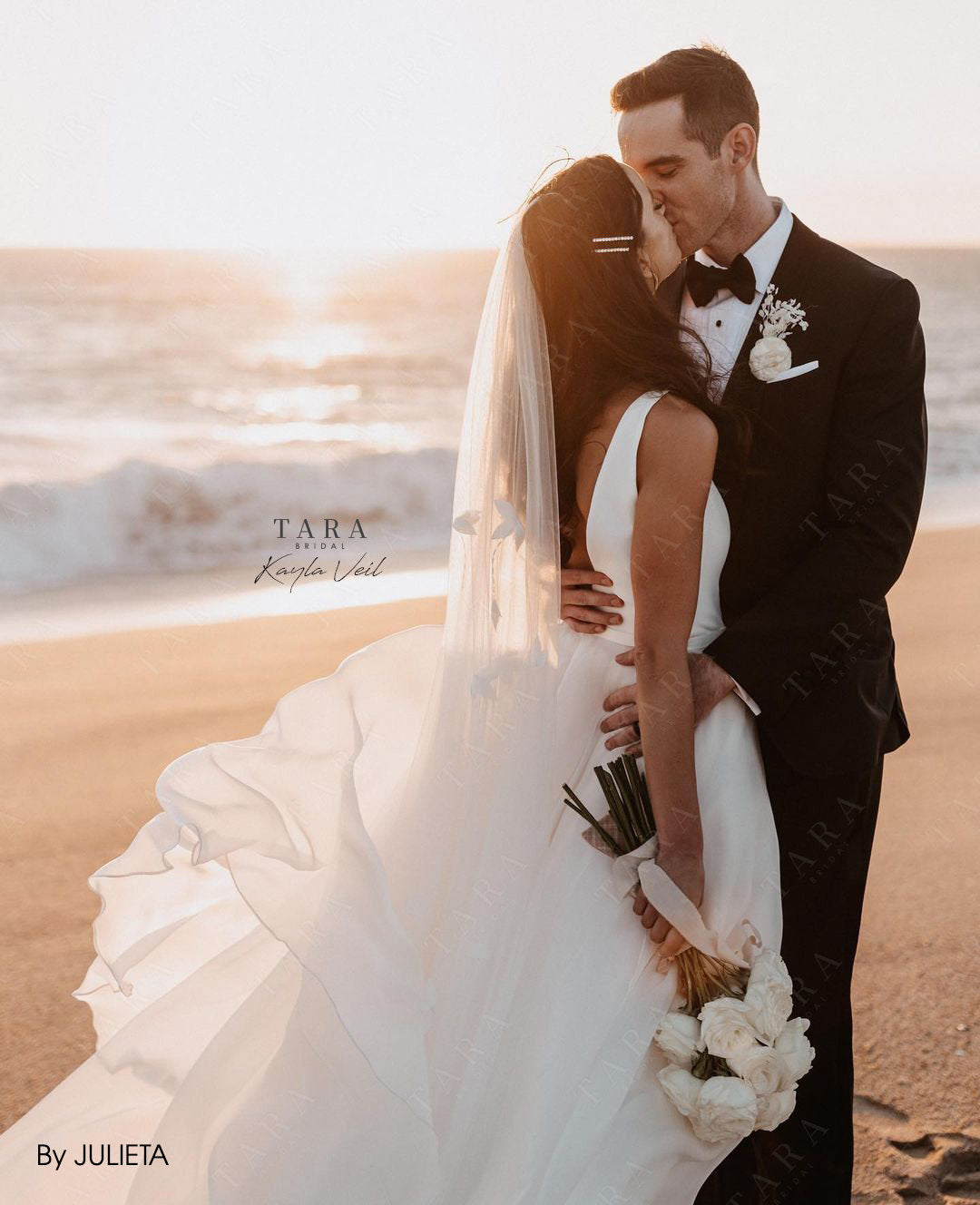 couple sunset photo wearing a weeding dress